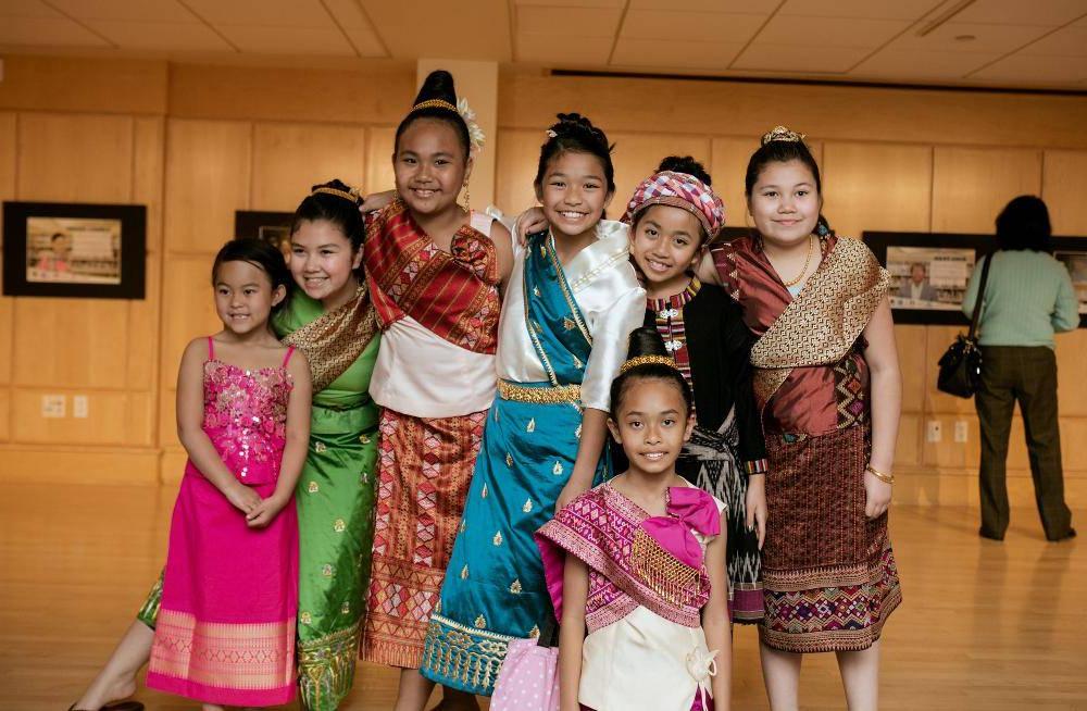 A group of girls dressed up to perform a dance